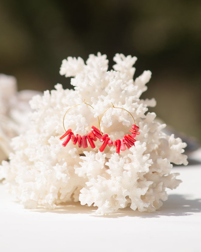 Creole earring with red coral beads