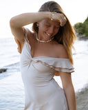 Bracelet breloque et perles d'eau douce plates