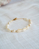 Bracelet coquillages trompettes perles d'eau douces