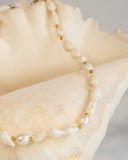 collier ras du cou coquillages trompettes fond blanc Jubai Swimwear Guadeloupe